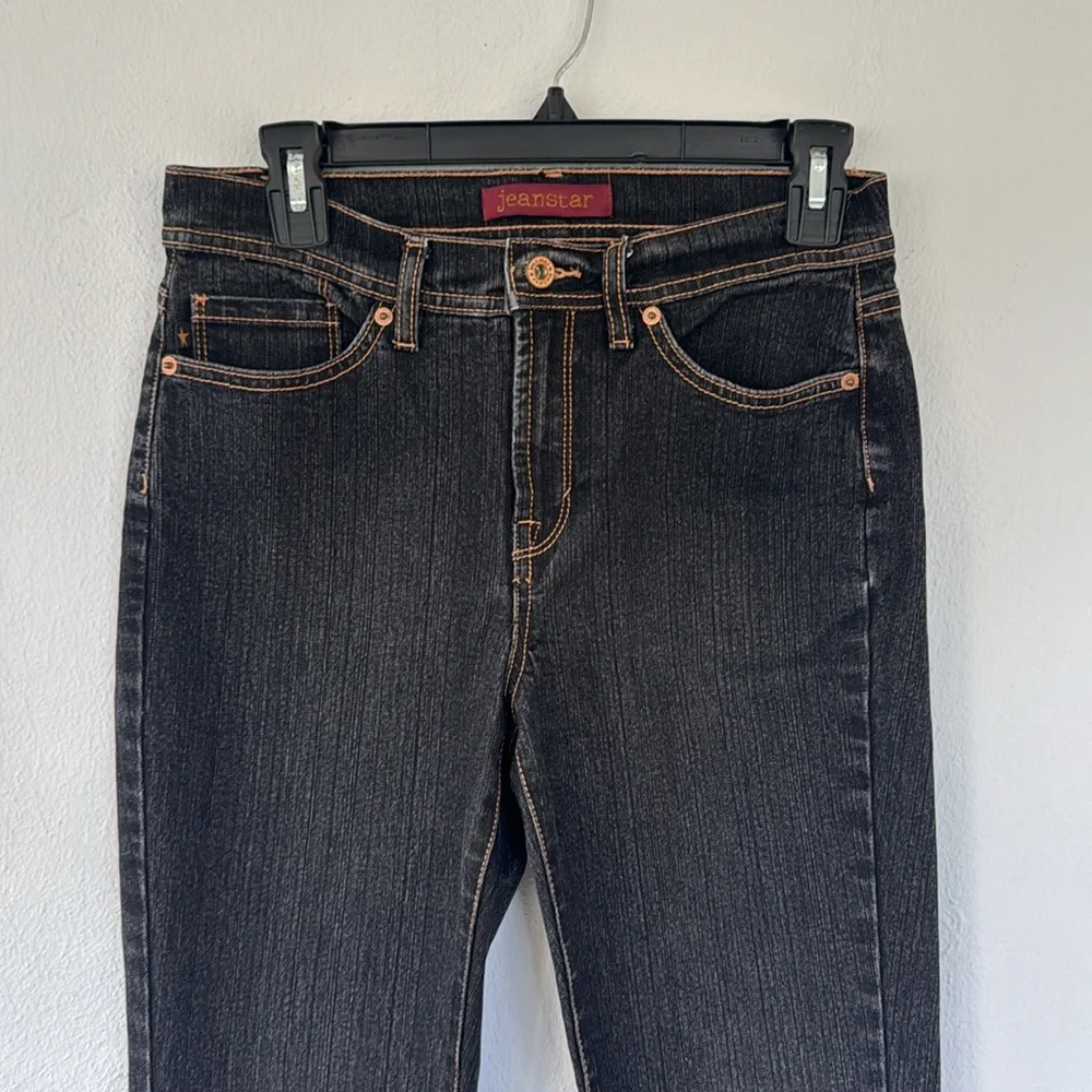 Jeanstar dark wash mid rise flare leg cotton stretch jeans size 4 short